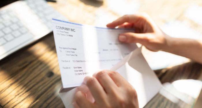 Insurance settlement check after car accident