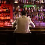 Man drinking at a Florida bar.