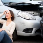 Car accident victim suffering injuries.