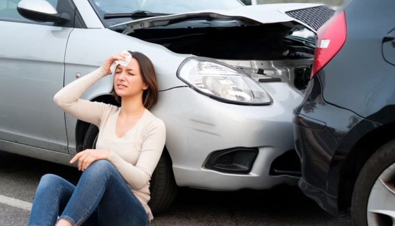 Car accident victim suffering injuries.