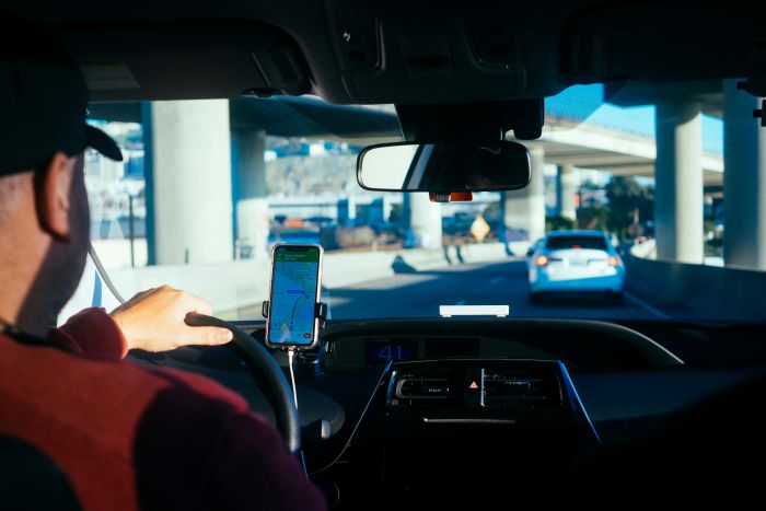 Rideshare driver avoiding car accident in Miami.